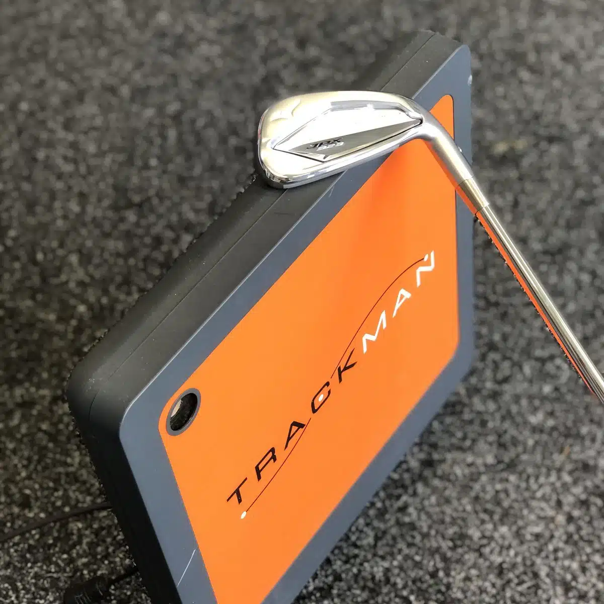 TrackMan unit and wedge in the Express Golf fitting bay
